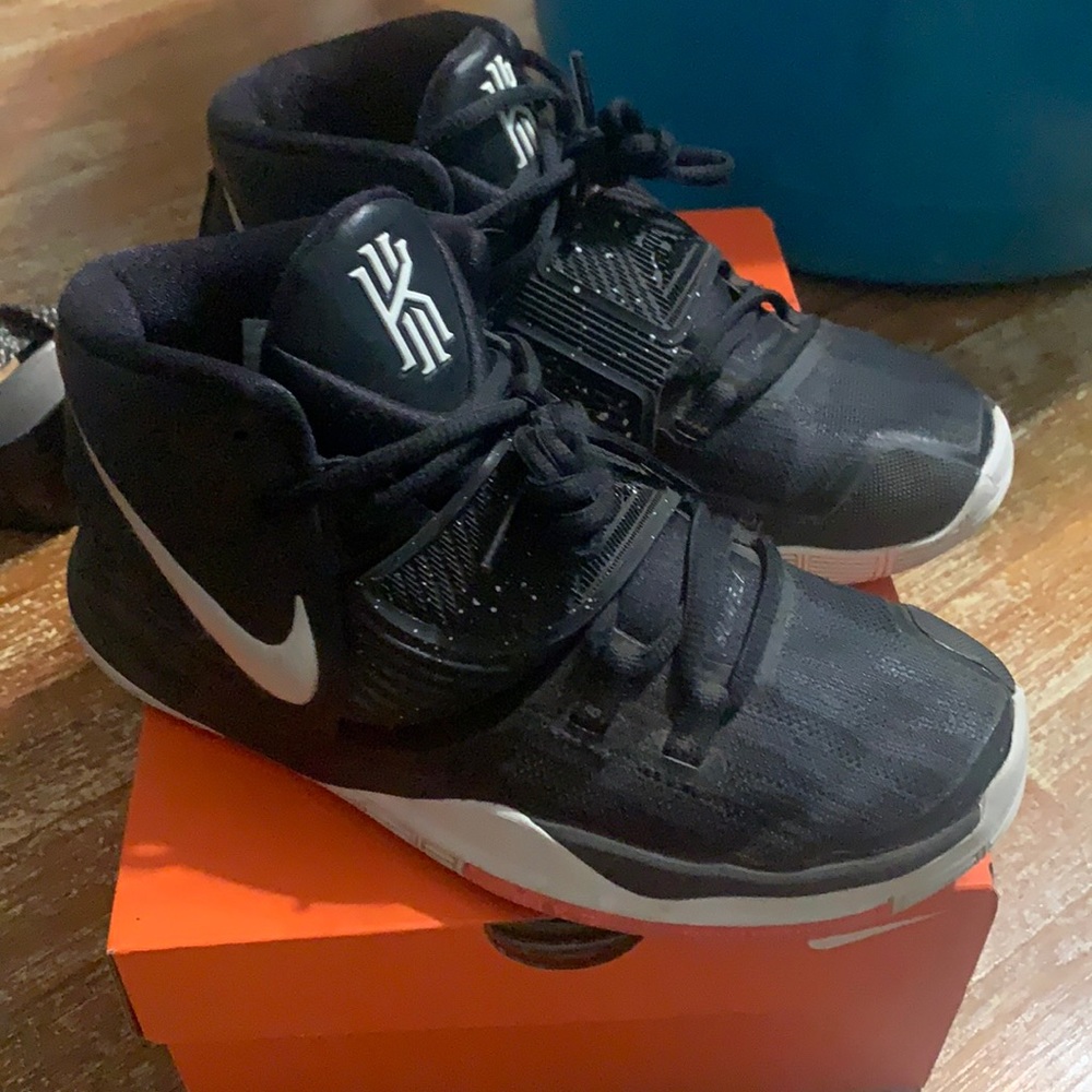 Black and white Kyrie basketball shoes
